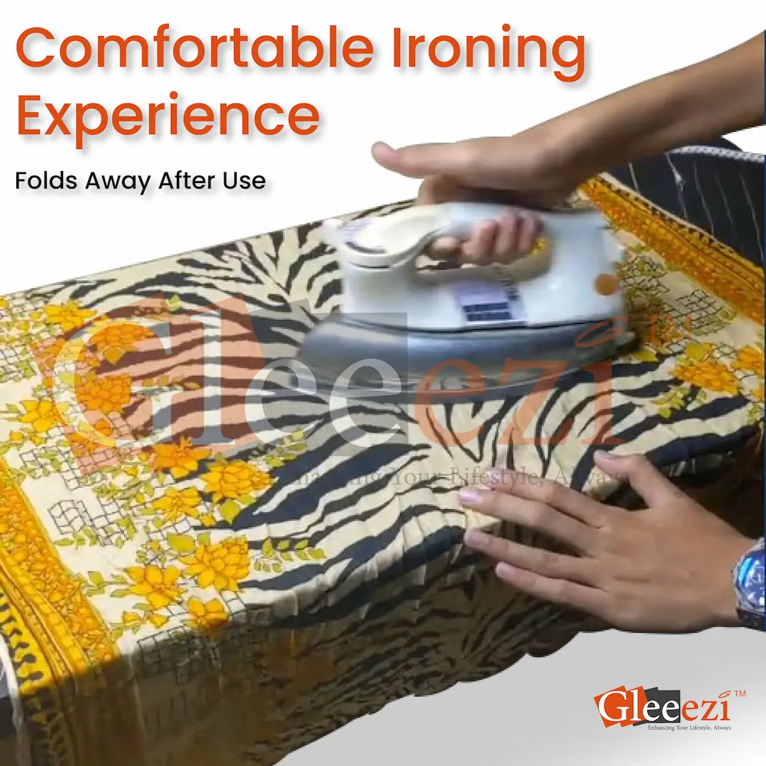 Person using an iron on a floral-patterned ironing board with Gleeezi branding.