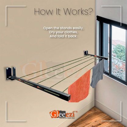 Gleeezi clothes drying stand with text on how to use clothes hanger, against a neutral wall.