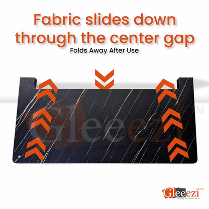 Gleeezi wooden Ironing table with text indicating fabric slides down through the center gap and folds away after use.